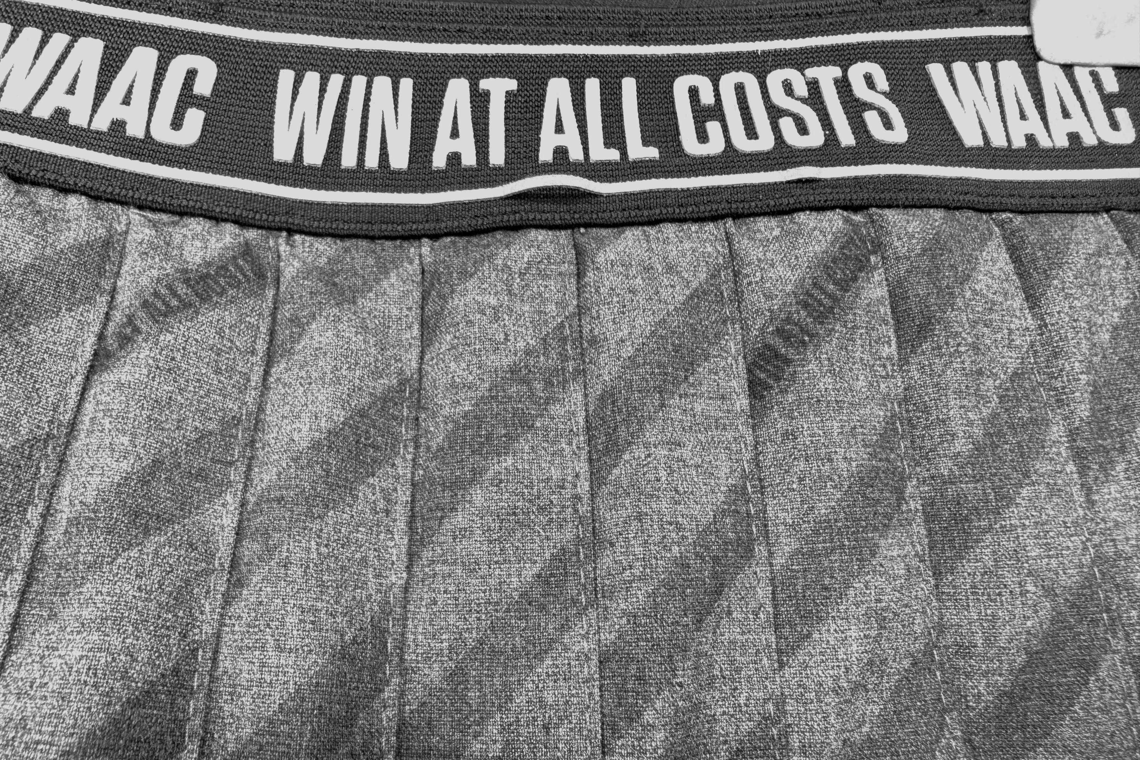 로고 밴딩 플리츠 스커트